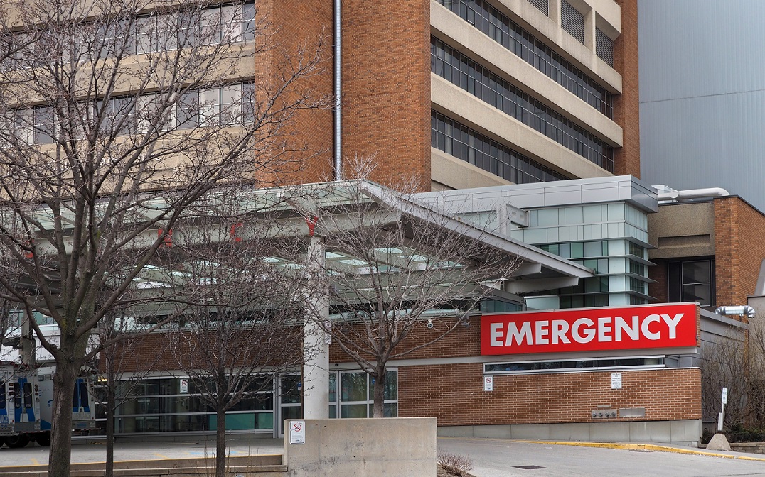 Image for The Top Hospital Payer and Healthcare Trends to Watch in 2023. An image of the entrance to an emergency room.